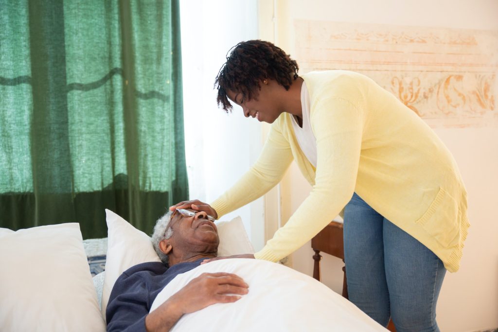 Elderly person receiving care in a hospital