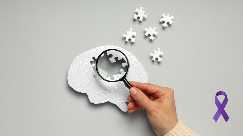 A person using magnifying glass on a paper puzzel of brain